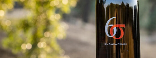 close up of six sigma wine bottle