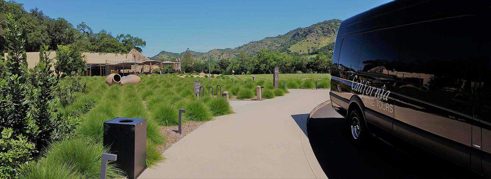 california wine tours shuttle bus parked in front of winery