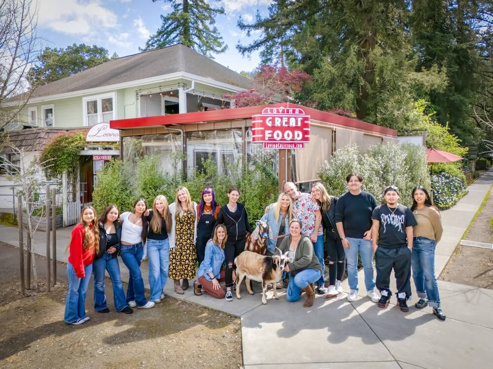 staff of lovina staying in front of the restaurant