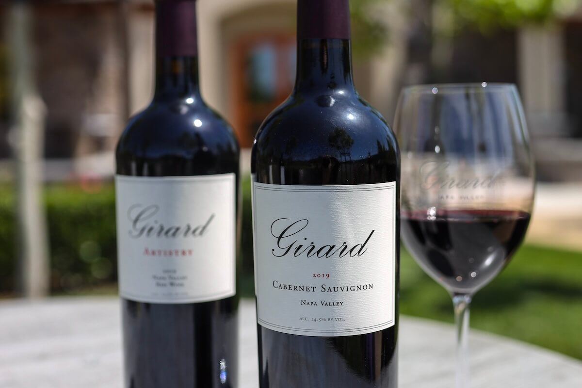 photo of girard cabernet sauvignon wine bottles with wine glass