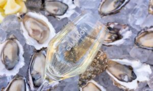 photo of chandon wine glass over oysters