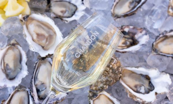 photo of chandon wine glass over oysters