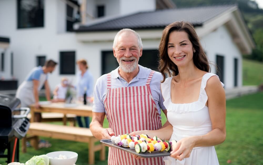 photo of father and daughter in bbq