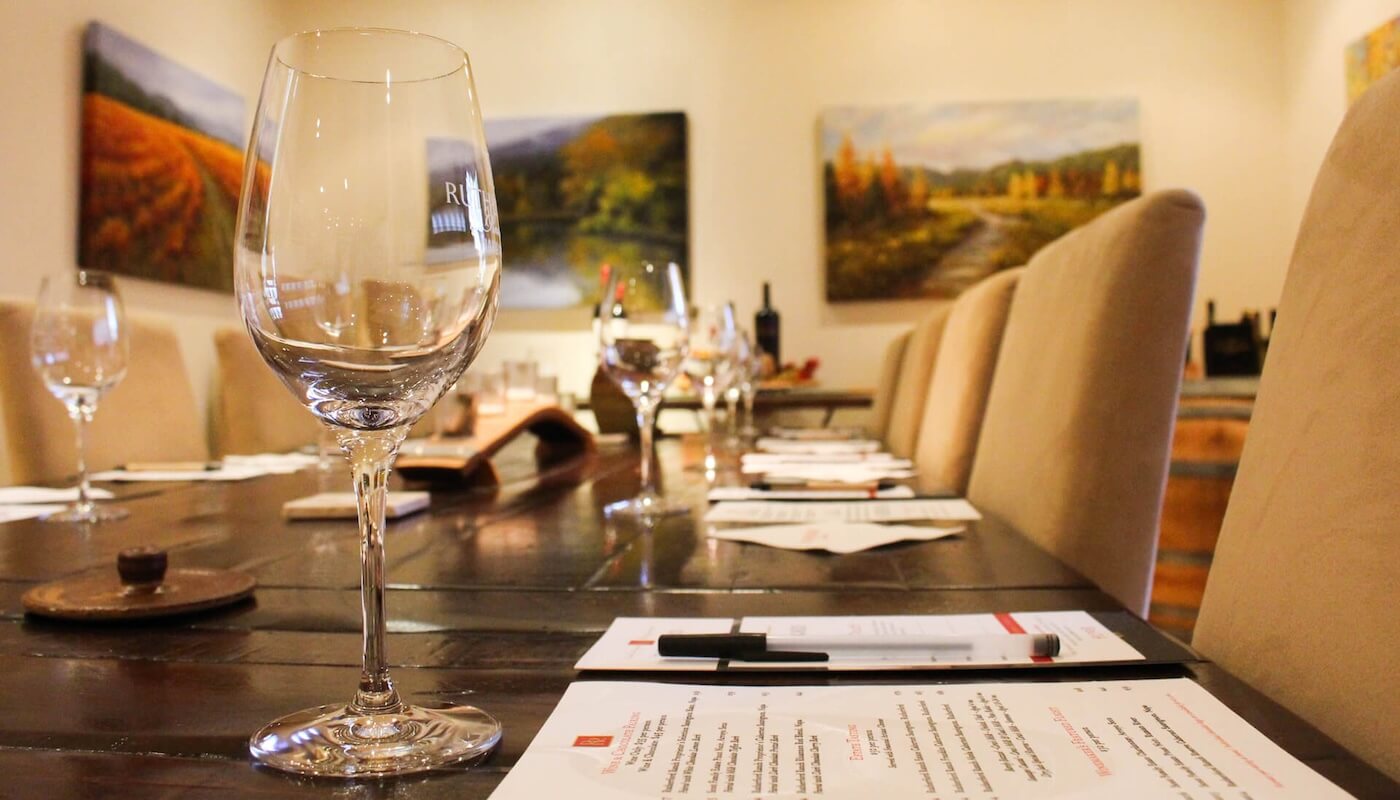wine glasses on table in tasting room
