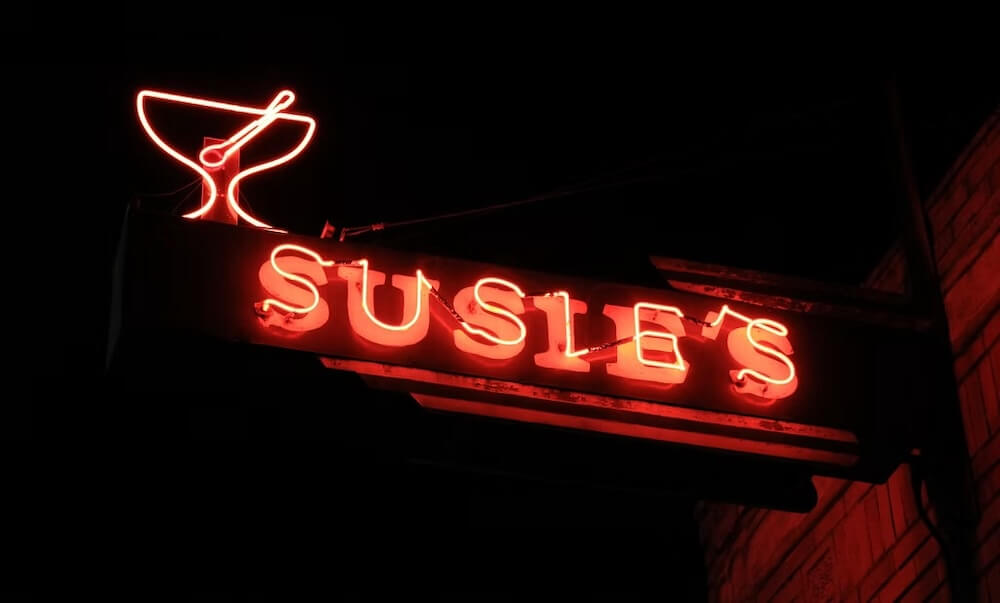 susie's bar light sign