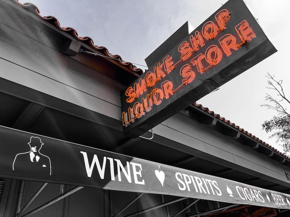 Papa Lou's Sign - saying "smoke shop liquor store"